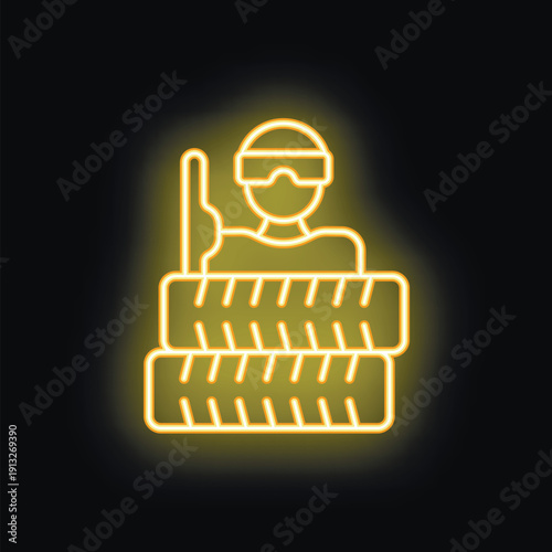 Yellow neon icon of a soldier taking cover behind a stack of tires, holding a weapon