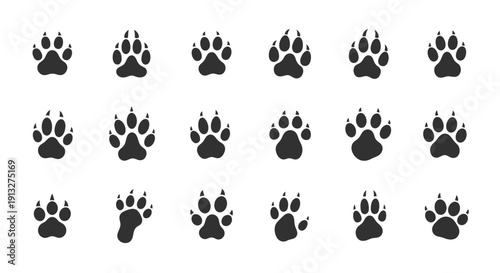 A high-resolution overhead shot of a diverse business team collaborating on a digital project around a wooden office desk featuring laptops and modern workspace accessories