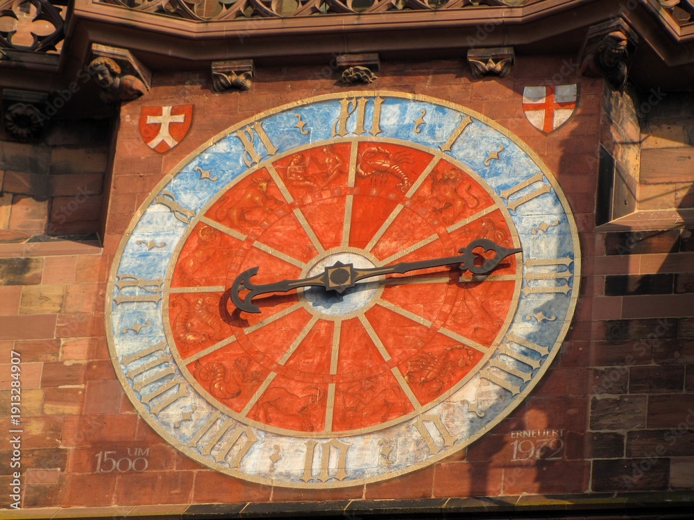 Obraz premium Telephoto detail of the astronomical clock inside Freiburger Münster, created around 1500 and restored in 1972. Medieval zodiac dial within Gothic cathedral interior, DE, 02 Mart 2011