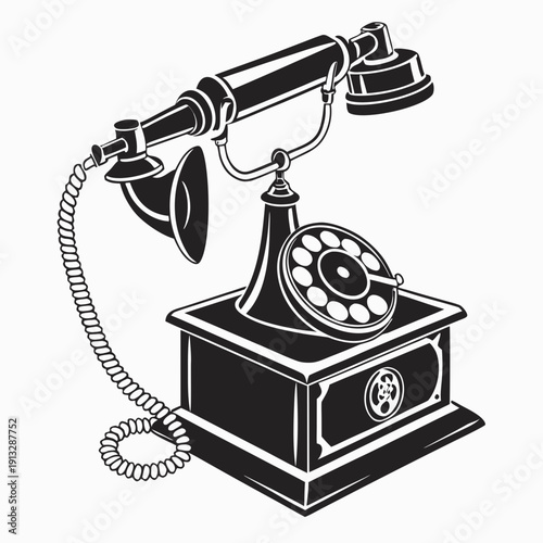 A black and white image of an old rotary phone