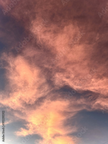 Dramatic Sky with Pink Clouds at Sunset, Creating a Beautiful and Colorful Evening Atmosphere, Perfect for Backgrounds and Wallpapers
