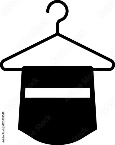 A black baby diaper hanging on a clothes hanger