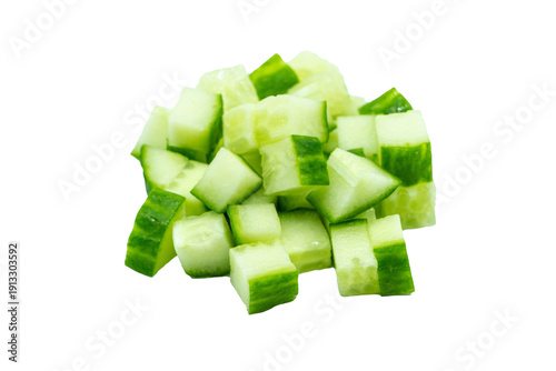 pile of fresh diced cucumber cubes isolated on white background