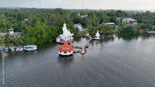 Kalutara, Sri Lanka – December 2, 2025: Calm lake view with reflections, lush greenery, and peaceful natural surroundings.