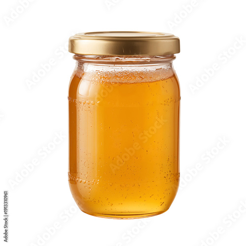 Honey Jar Placed on a White Surface in a Kitchen Setting During Daylight