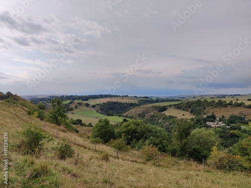 The rolling hills over the Yorkshire countryside, during summer showing farms and high clouds, Yorkshire, UK