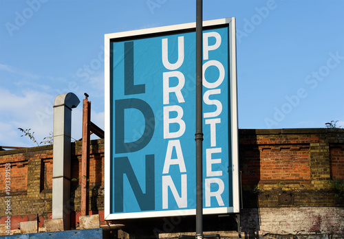 Real photo of Vertical billboard in sunny London. PSD template Mockup.