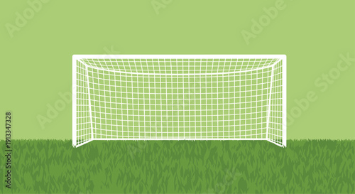 White soccer goal net standing on a green grass field under a clear sky representing sports competition and outdoor play.