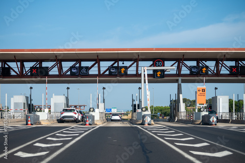 Scenic highway journey along A9 motorway, featuring toll barriers, connecting major cities from Montpellier to Lyon, with traffic flow and road infrastructure