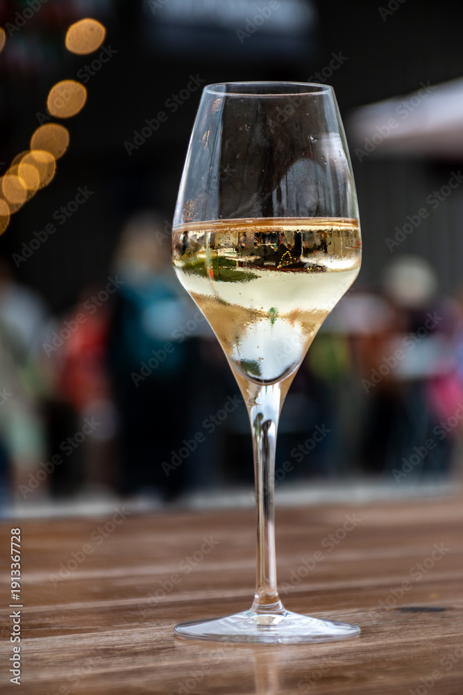 Obraz premium Tasting of vintage champagne sparkling wine on yearly Champagne festival in Cote des Bar, France, summer travel destination