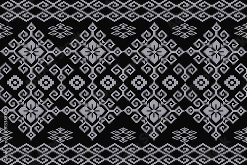 This is a digital drawing canvas displaying a black background and silver geometric pattern composed of repeating diamond and floral motifs arranged I a symmetrical.
