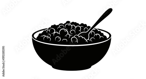 Bowl of Blackberries with Spoon Inside.