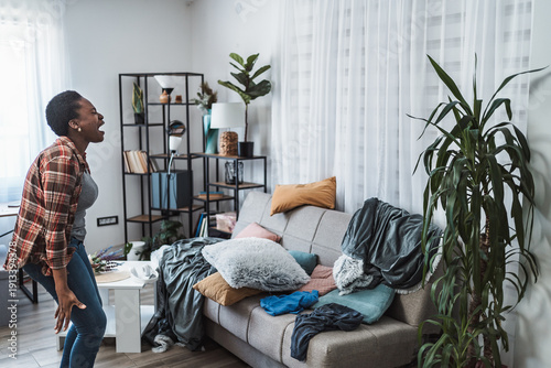 Wallpaper Mural Young woman screaming because her apartment is a mess Torontodigital.ca