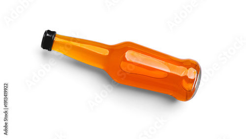 Photography A bottle of orange drink on a white background