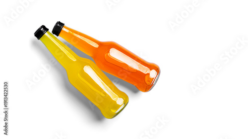 A bottles of orange drink on a white background. High quality photo