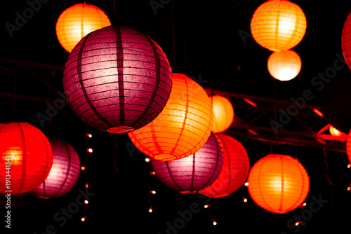 Canvastavla chinese lantern festival Vibrant red, orange, and purple paper lanterns illuminate the dark night, creating a warm, festive atmosphere rich in Asian cultural heritage and celebration