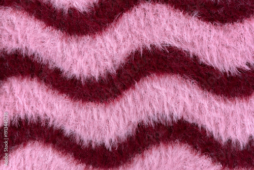 Cuadro en lienzo Detailed texture of soft fluffy fabric with a vivid, contrasting pink and burgundy horizontal wavy pattern