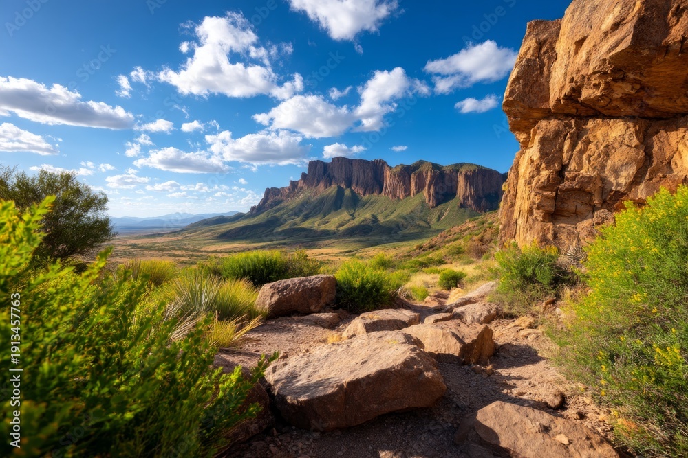 Obraz premium Stunning Apache Landscape Featuring Rugged Cliffs and Desert Terrain