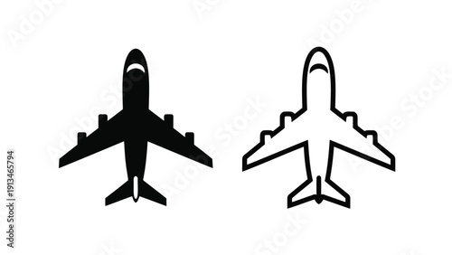Two stylized airplane icons one black and one white are presented in a top down view