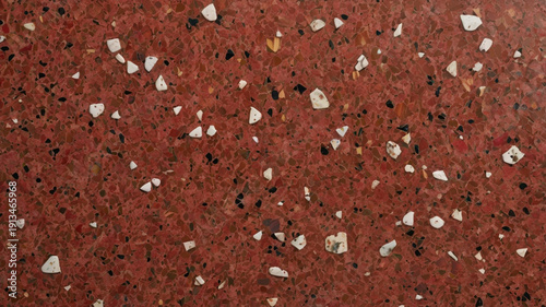 A terrazzo red surface with a polished concrete look, blending marble and granite chips to create a smooth, decorative texture. Ideal for floors, walls, and modern interior finishes.
