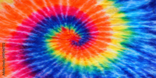 A vivid explosion of psychedelic rainbow swirls and fractal patterns creates a colorful abstract art backdrop with a creative paint texture and blurred yellow light design