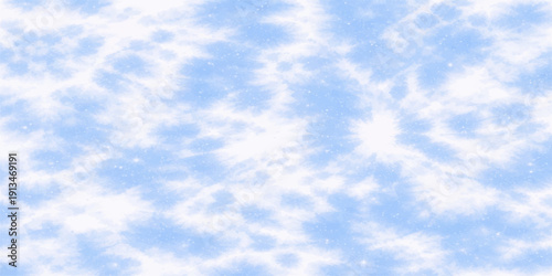 A beautiful bright blue sky background filled with fluffy white clouds on a clear sunny day creates a natural summer cloudscape and a peaceful atmosphere of heaven