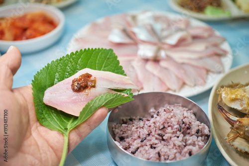 Fotografie A plate of fresh 'Banji-hoe' (Raw Large-eyed Herring)