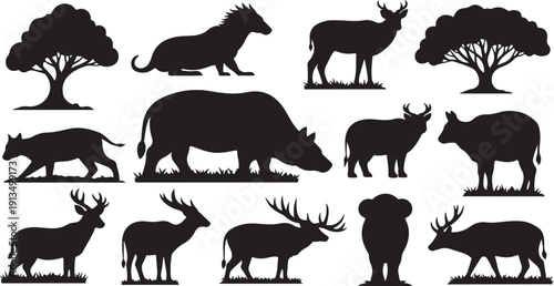Silhouettes of various wild animals and trees in landscape