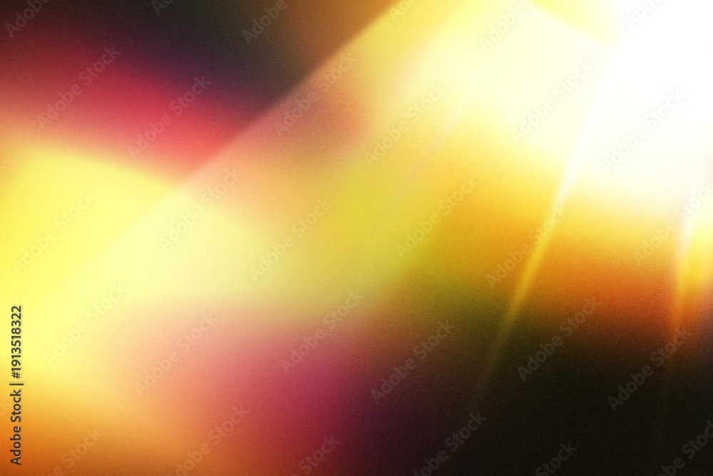 Fototapeta premium An abstract image showcasing a vibrant burst of light with radiant flares and a dark background