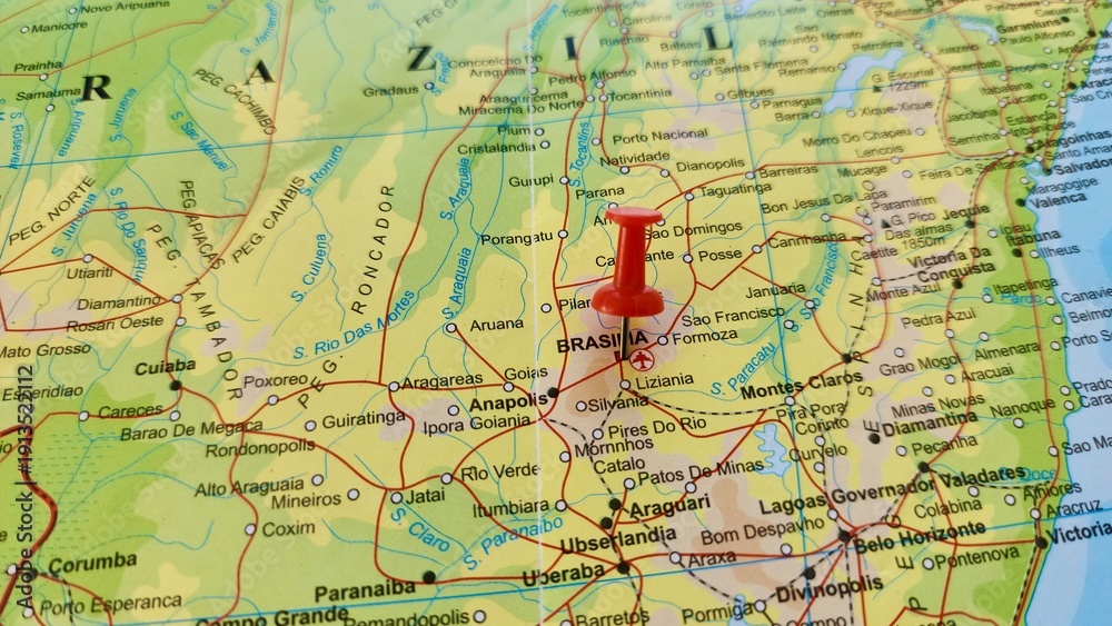 Naklejka premium View of Brasilia, Federal capital of Brazil, on a geographical map of America, marked with red push pin