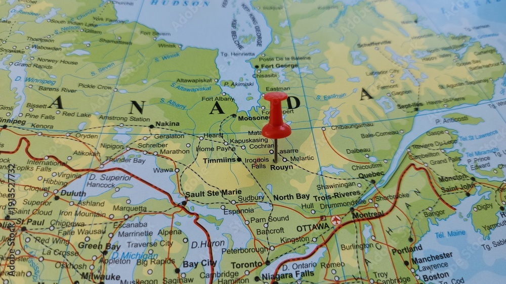 Naklejka premium View of Rouyn-Noranda, City in the province of Quebec, Canada, on a geographical map of America, marked with red push pin