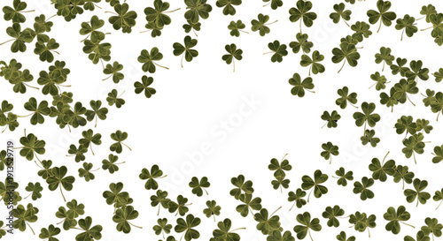 Dark green clover border framing a white central copy space,  A border frame composed of numerous dark green three-leaf clovers, surrounding an empty white central space.