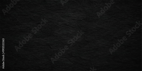 A dark grunge wallpaper features a rough black paper texture with a macro surface design, blending gray textile material and weathered leather patterns into a seamless dark canvas backdrop