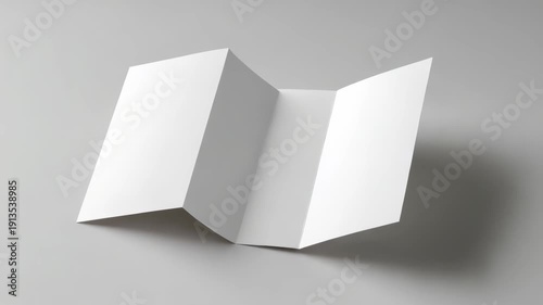 Blank tri fold brochure mockup lying on a light gray background, showcasing clean and minimalistic design. Perfect for branding, marketing presentations, and creative advertising projects