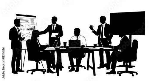 Business professionals collaborating in a meeting room with laptops and presentation boards