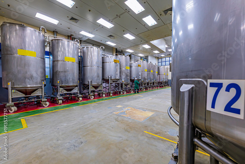 Εκτύπωση καμβά Stainless vertical steel tanks and pipes with pressure meter in equipment tank c