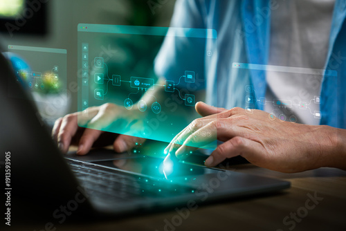 Bilde på lerret Business professional using laptop with AI workflow automation interface, displa