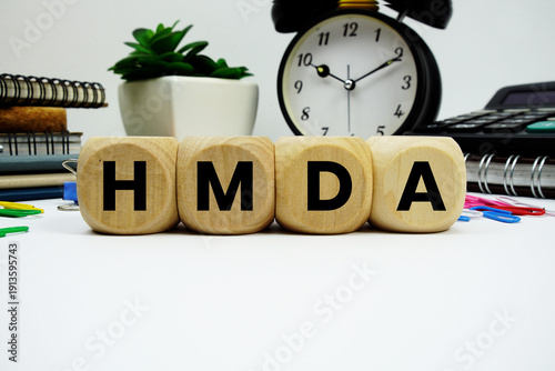 Obraz na plátne HMDA (Home Mortgage Disclosure Act) alphabet letters with alarm clock and calcul