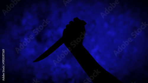 Konstfotografi silhouette of hand holding knife preparing to stab on blue background