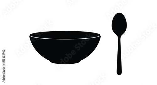 A black bowl and spoon depicted in a striking silhouette