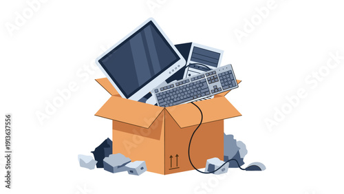 Cardboard box packed with discarded old computer hardware including a monitor, keyboard, and system unit representing electronic waste.