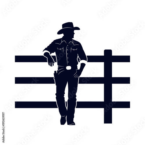 Silhouette of a cowboy leaning on a wooden fence