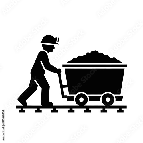 Miner pushing a cart full of coal on railway tracks.