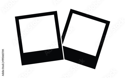 Two black instant photo frames are positioned as if torn apart