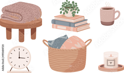 Cozy living space with blankets, books, and warm drinks displayed