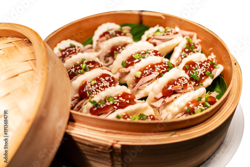 Top view ofSoft bao buns filled with tender bbq beef crunchy Korean slaw and gochuJang aioli, focus selective