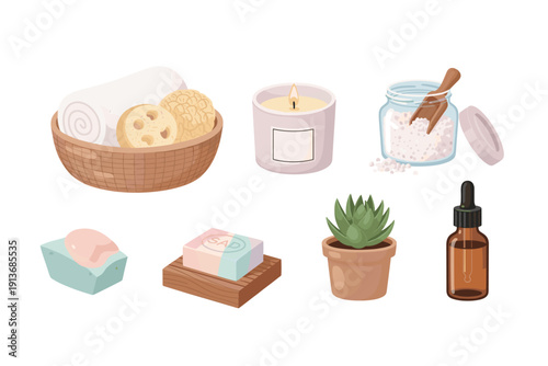 Relaxing bath setup with towels, candles, and bath products
