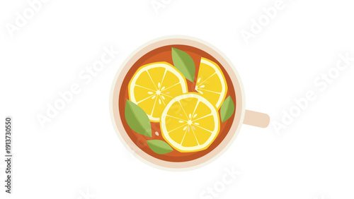 Delicious hot tea served in a ceramic cup garnished with fresh lemon slices and green mint leaves from a top view perspective.