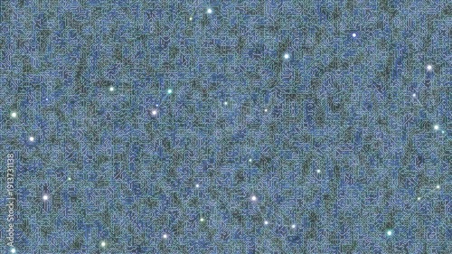 Close-up shot of a blue and green textured surface with white specks against a white background.