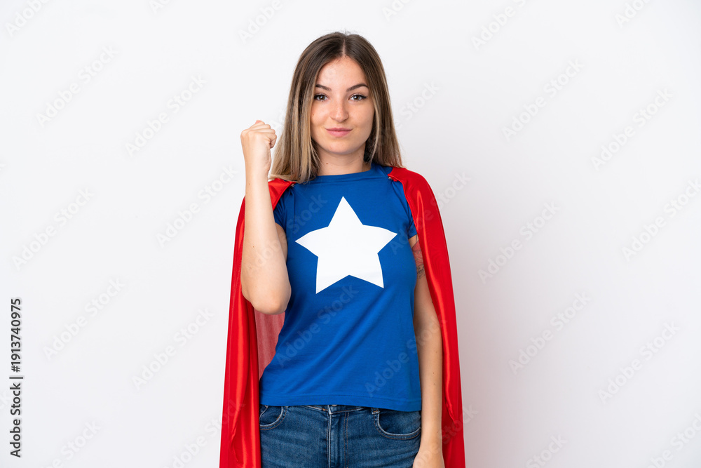 Fototapeta premium Young Romanian woman isolated on white background in superhero costume